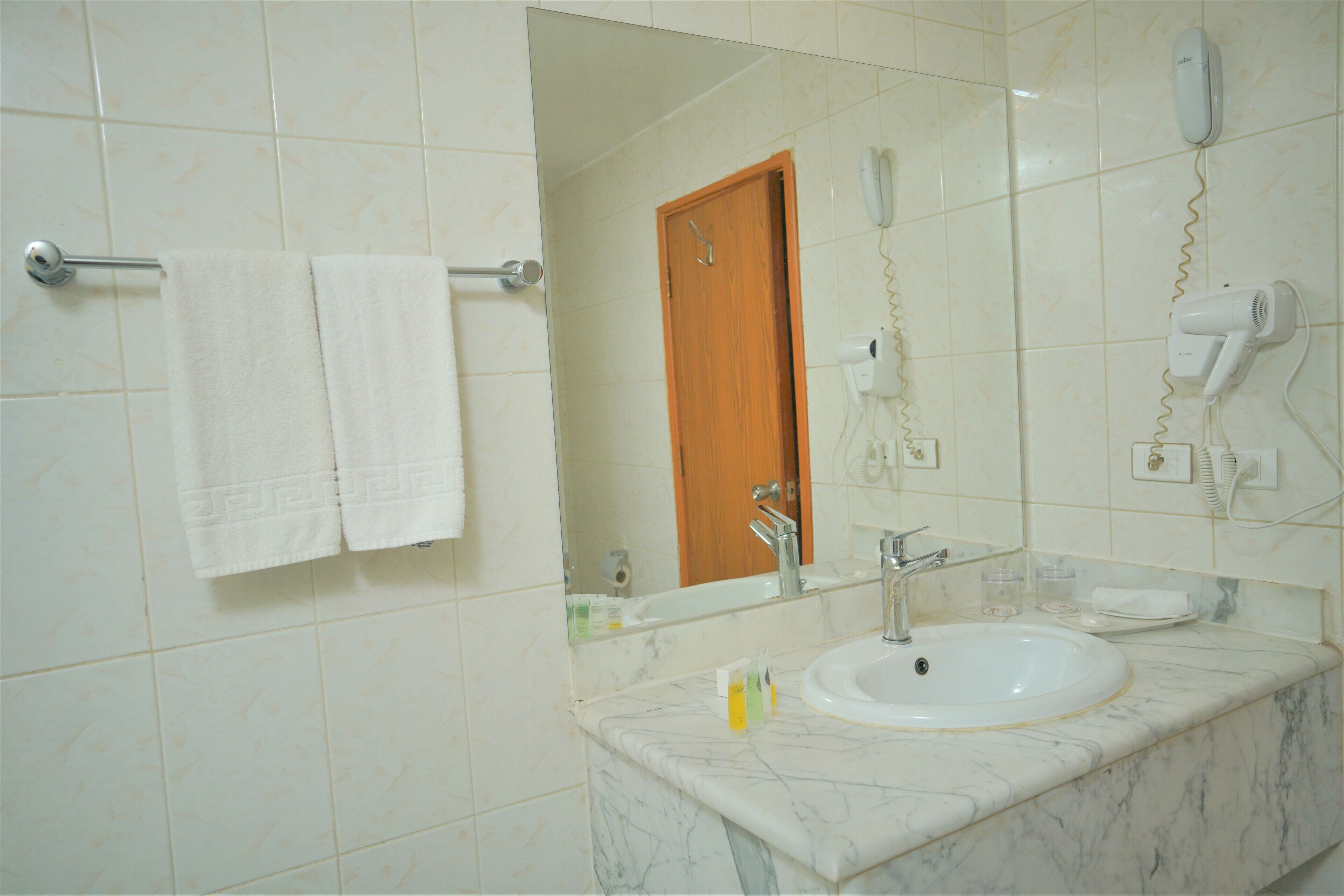 standard triple room | bathroom | bathtub, hair dryer, bidet, towels