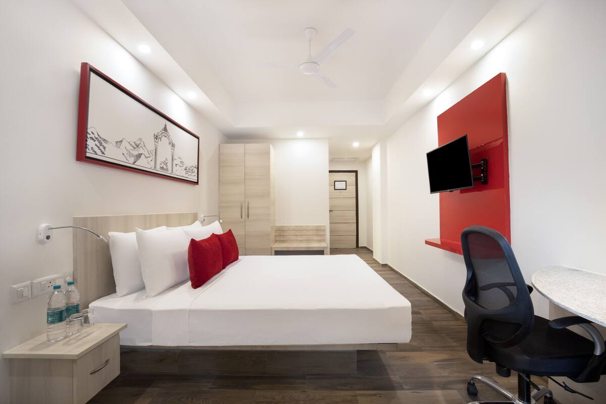 Habitación Deluxe | Escritorio, camas extra, wifi y ropa de cama
