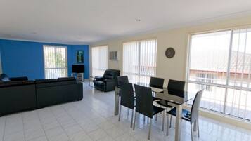 Apartment, 3 Bedrooms | Living area | Smart TV