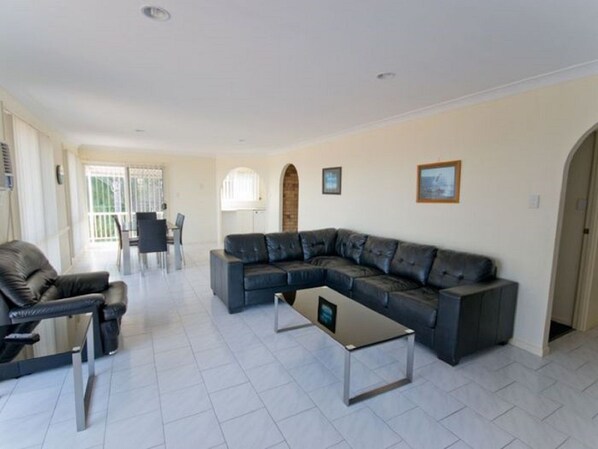 Apartment, 3 Bedrooms | Living area | Smart TV