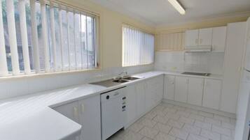 Apartment, 3 Bedrooms | Private kitchen | Fridge, microwave, oven, stovetop