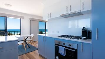Apartment, 3 Bedrooms | Private kitchen | Fridge, microwave, oven, stovetop