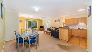 Apartment, 3 Bedrooms | Living area | Smart TV