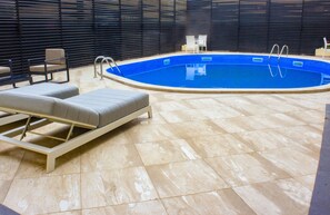 Indoor pool, outdoor pool, open 6:00 AM to 6:30 PM, pool umbrellas