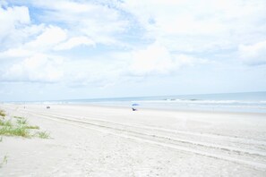 On the beach, sun loungers, beach towels