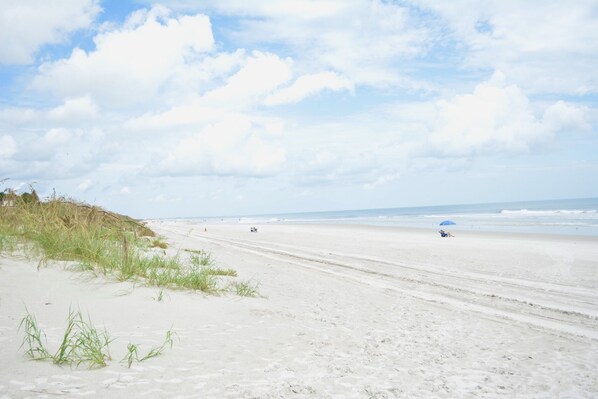 On the beach, sun loungers, beach towels