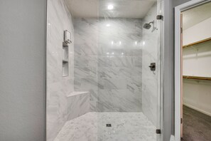 Combined shower/tub, hair dryer, towels, soap