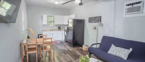 Apartment (1 Bedroom) | Living area | 50-inch TV with digital channels