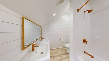 Combined shower/tub, hair dryer, towels, soap