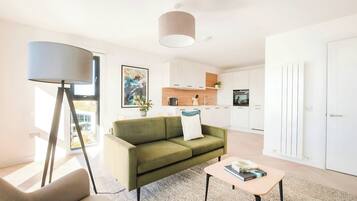 50-inch flat-screen TV with cable channels, TV