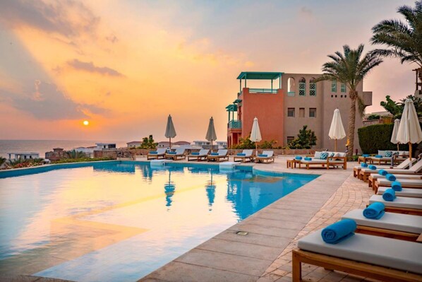 7 outdoor pools, pool umbrellas
