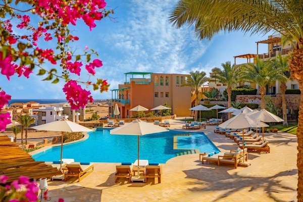 7 outdoor pools, pool umbrellas