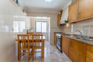 Fridge, microwave, oven, cookware/dishes/utensils