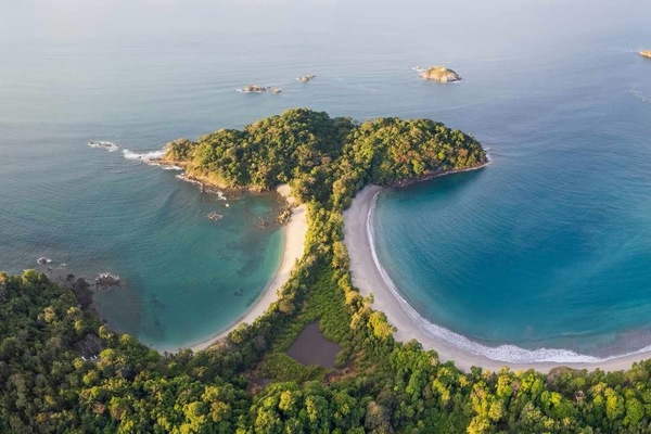 Aerial view of stunning Manuel Antonio National Park and beach minutes away.