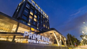 A modern hotel with a prominent sign reading "Prime Park Hotel & Convention". - Prime Park Hotel & Convention Lombok (Mataram)