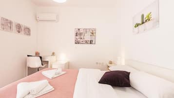 Apartment, 2 Bedrooms, Balcony, Ocean View | 2 bedrooms, iron/ironing board, travel cot, bed sheets