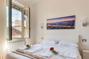 1 habitación, tabla de planchar con plancha, wifi gratis y ropa de cama