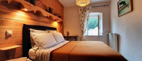 1 chambre, fer et planche Ă repasser, Wi-Fi gratuit, draps fournis