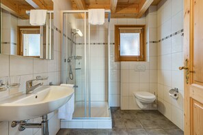Bathtub, hair dryer, towels
