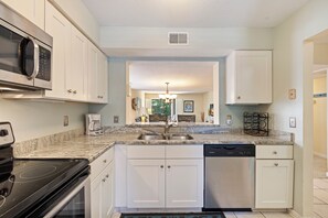 Fridge, microwave, dishwasher, coffee/tea maker