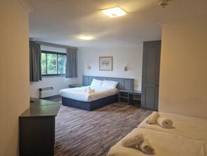 Family Triple Room | Desk, iron/ironing board, free WiFi, bed sheets