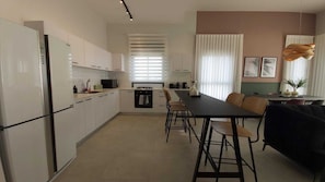 Apartment | Private kitchen | Full-sized fridge, oven, dishwasher, toaster