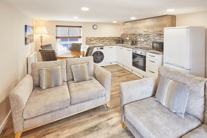 Appartement | Coin séjour | Télévision à écran plat de 32 pouces avec chaînes numériques, télévision
