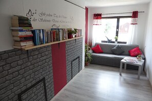 Chambre Double | Coin séjour