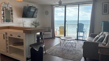 Premium Condo, 1 King Bed with Sofa bed, Balcony, Beach View | Living room | 50-inch Smart TV with digital channels