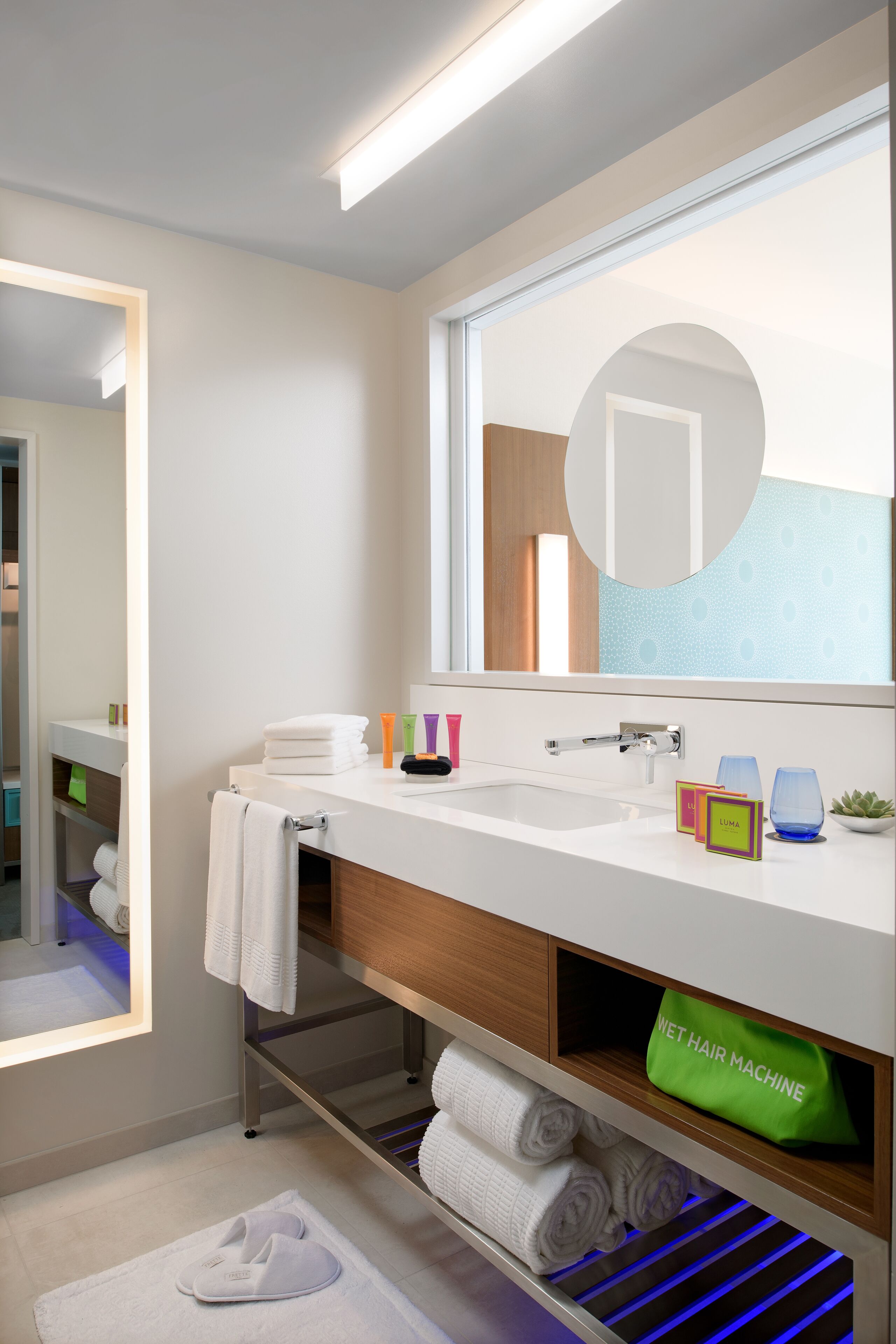 designer toiletries, hair dryer, bathrobes, towels