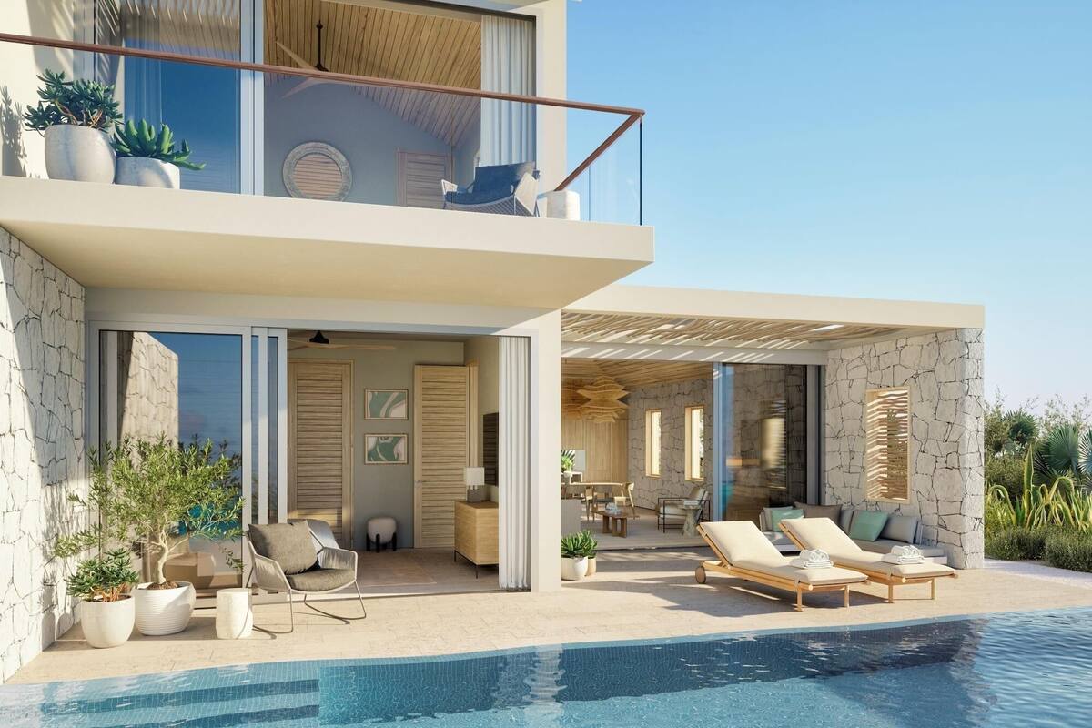 A modern two-story house with a swimming pool, outdoor seating, and potted plants.
