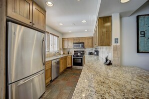Fridge, microwave, oven, stovetop - Resort Plaza #5065 by AvantStay | Ski In Ski Out Home in Park City (Park City)
