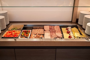 Daily buffet breakfast (CHF 27 per person)