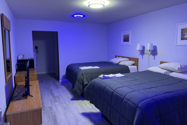 Economy Double Room, 2 Double Beds, Non Smoking | Minibar, laptop workspace, iron/ironing board (on request), WiFi (free)