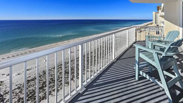 A balcony with a view of the beach and ocean. - Newly remodeled and close to everything you need at Sea Glass Serenity.  (Navarre)
