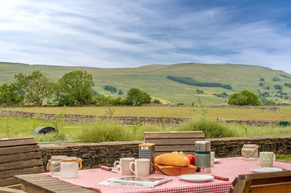 Set in 27 acres of farmland, this semi-detached converted barn situated in Upper Wensleydale near As