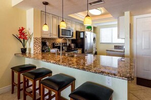 Condo, Multiple Beds, Private Pool, Ocean View | Private kitchen | Fridge, microwave, stovetop, dishwasher - Carlos Pointe 124, 2 Bedrooms, Gulf Front, Heated Pool, Sleeps 6 (Fort Myers Beach)
