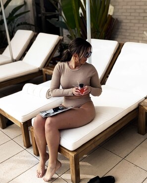 Outdoor pool, open 9:00 AM to 6:00 PM, free pool cabanas, pool umbrellas