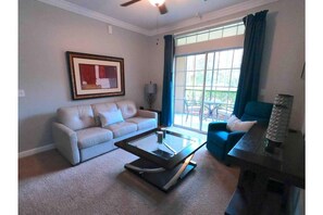 Living area - Lovely 3 Bedroom Condo at Tuscana Resort - Orlando (Championsgate)