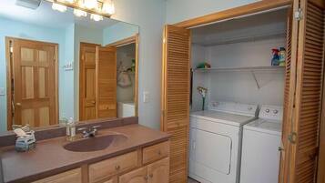 Combined shower/bathtub, hair dryer, towels, soap