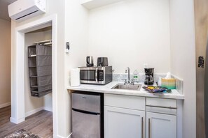 Microwave, coffee/tea maker, cookware/dishes/utensils