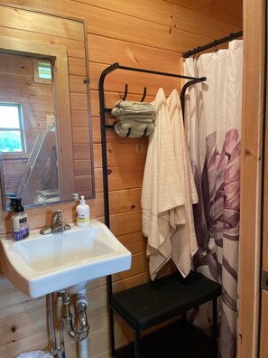 Shower, towels, soap, shampoo