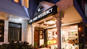 A hotel entrance with a sign reading "HOTEL HAND RESIDENCY." - Treebo Nand Residency (Dehradun)