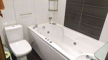 Tina con regadera y tina de hidromasaje