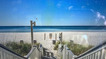 On the beach, sun-loungers, beach towels