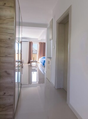 1 bedroom, desk, iron/ironing board, travel cot