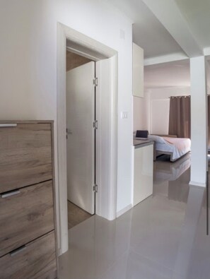 1 bedroom, desk, iron/ironing board, travel cot