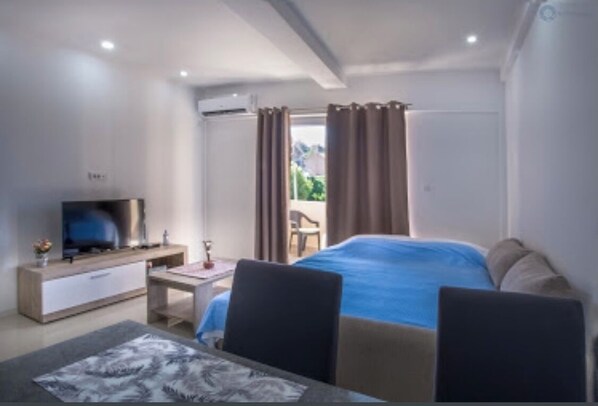 1 bedroom, desk, iron/ironing board, travel cot