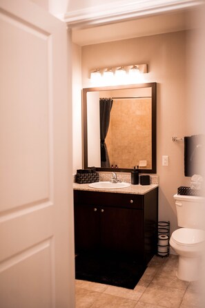 Combined shower/bathtub, hair dryer, towels, soap