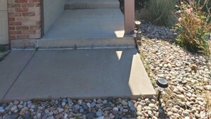 A house with a brick exterior, a welcome sign, a front door, and a large arched window. - 2 Master Suites/3 King Beds/4 Bath/Mins to Airport (Colorado Springs)